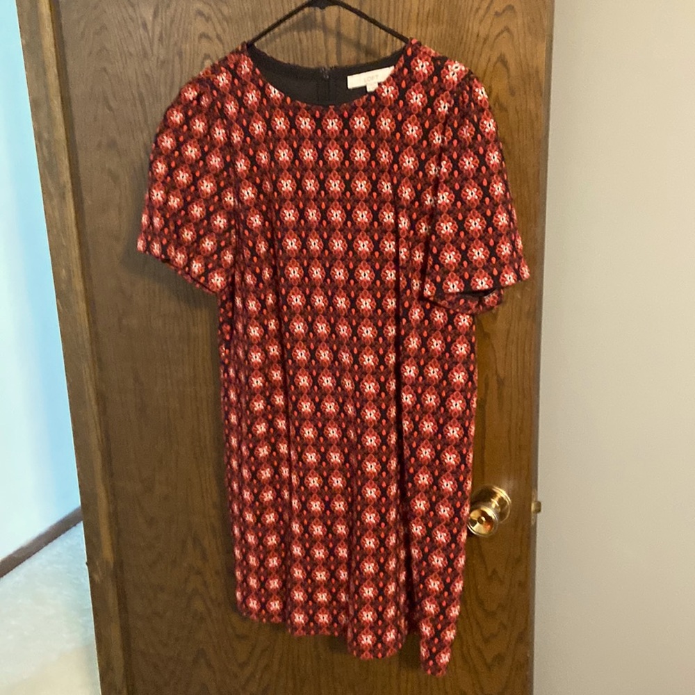 Red, white, and black shift dress.